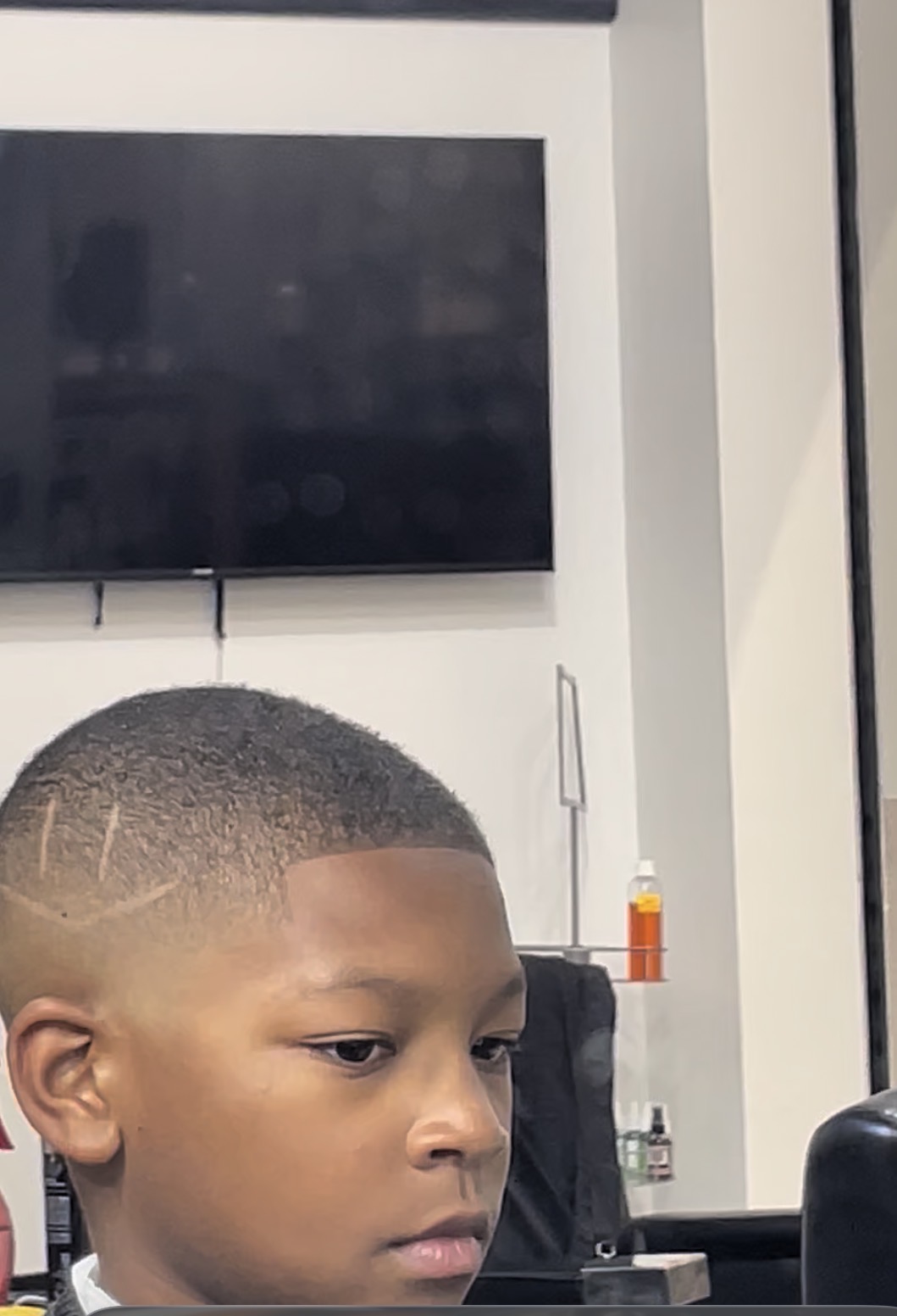 Kids' fade with a clean design detail at 354 Hair Studios